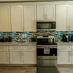 Enjoy This Mini-Mansion Near Downtown And The Airport!
